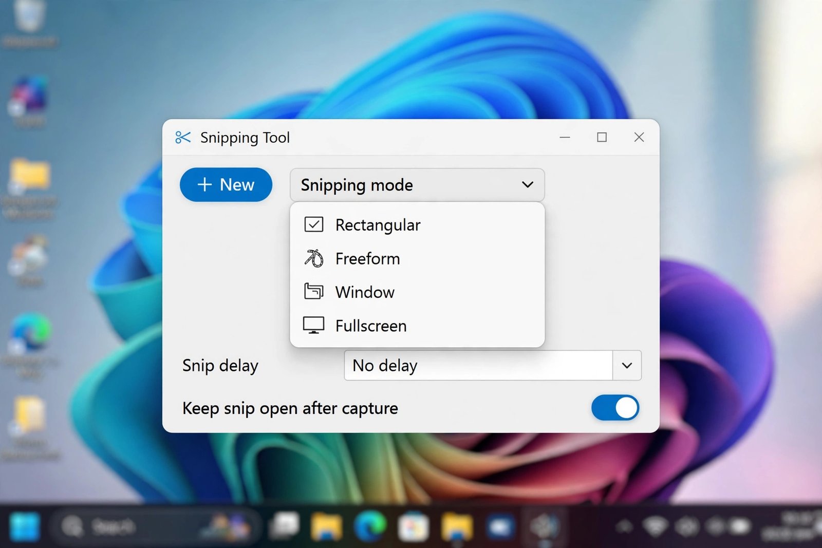 Snipping Tool window open on a Windows desktop showing the New button and snipping mode options