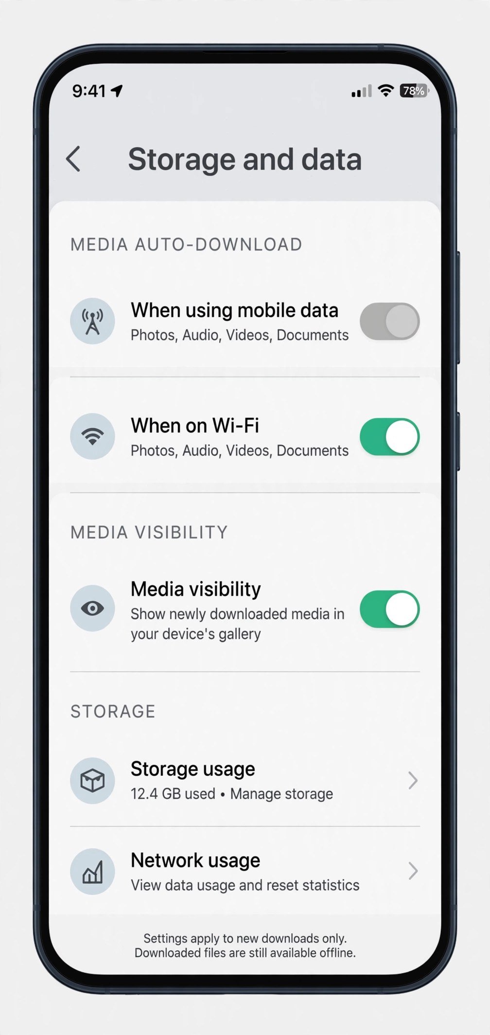 Phone screen showing WhatsApp storage and data settings with media auto-download options